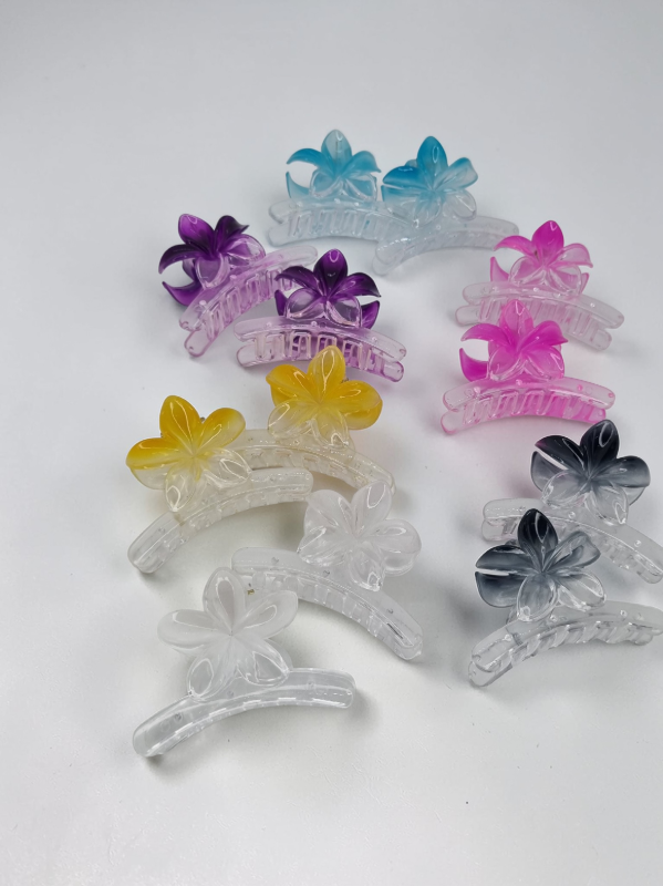 Producto - Blister broches x12u alarg con flor transp color 9083