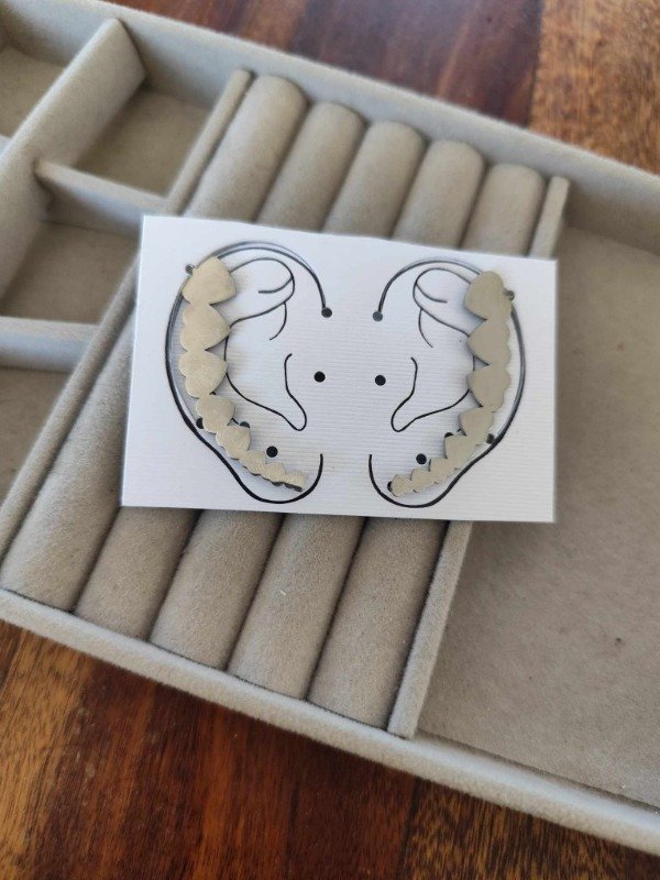 Producto - Aros trepadores corazones . Acero quirúrgico