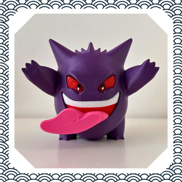 Producto - Figura Gengar Pokémon pegado a la ventana