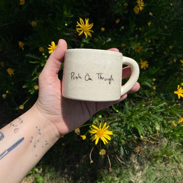 Producto - Taza Push on through