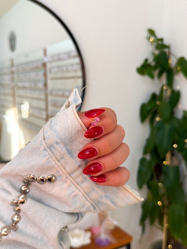 Producto - Abridores acero blanco cúbic corazón fucsia