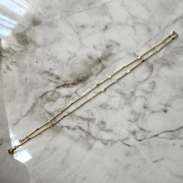 Producto - COLLAR CHAPITAS CON CIERRE ENCHAPADA en oro 18k