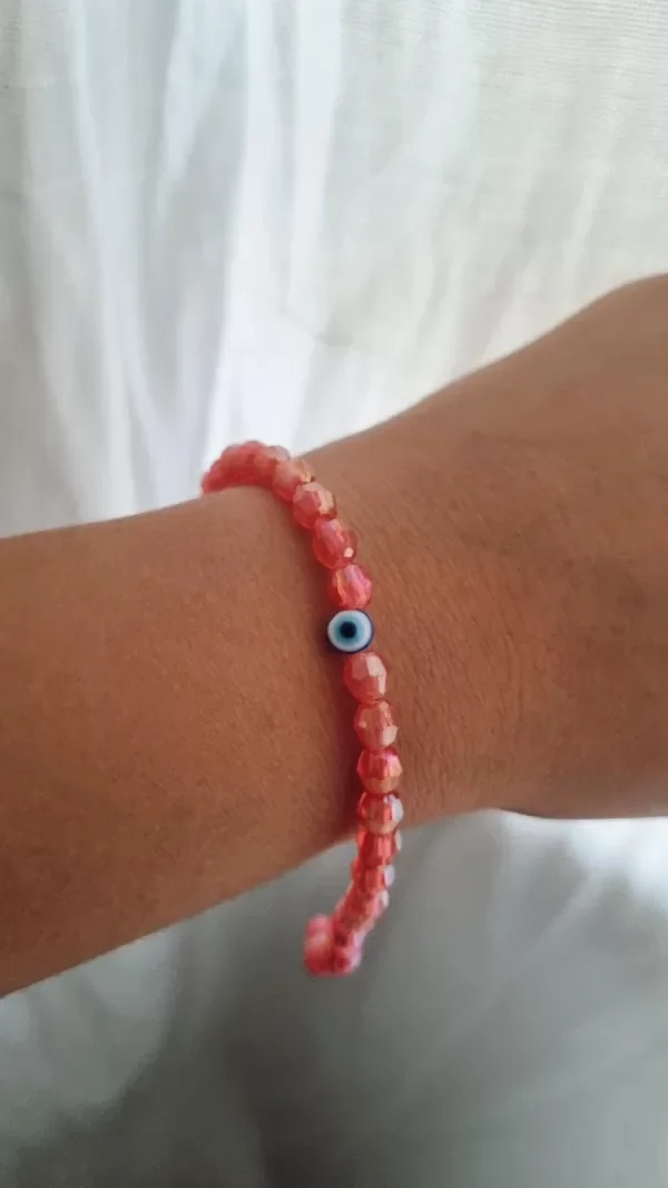 Producto - Pulsera ojito tornasol rojita aq