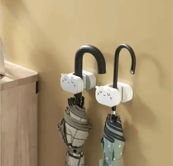 Producto - Soporte Para Escoba Adhesivo Con Gancho Gato Blanco Plástico