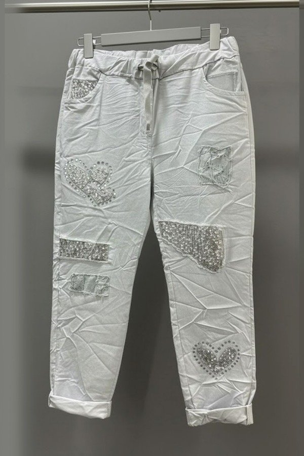 Producto - BABUCHA CORAZON PLATA. Cede hasta 130