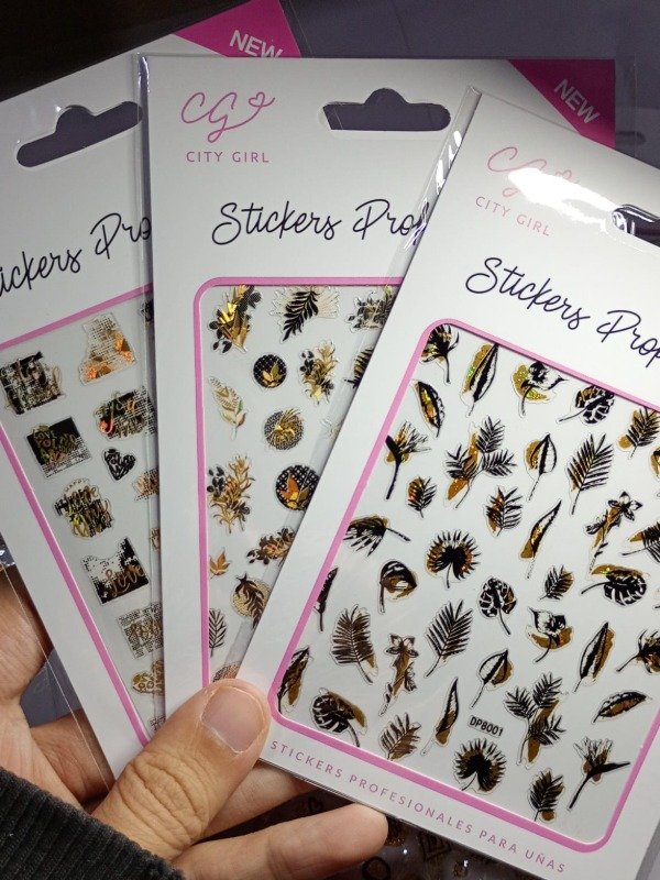 Producto - Sticker dorado y negro