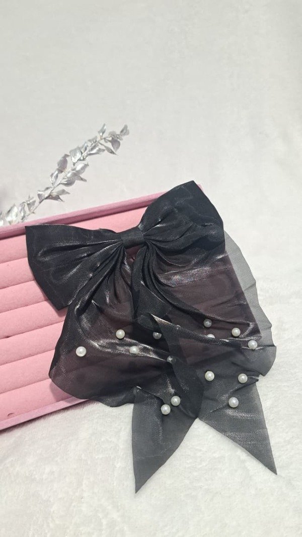 Producto - traba de moño negro con perlas