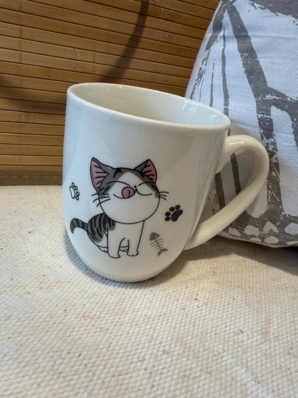 Producto - Taza gato tierno - (Efectivo: 7.920)