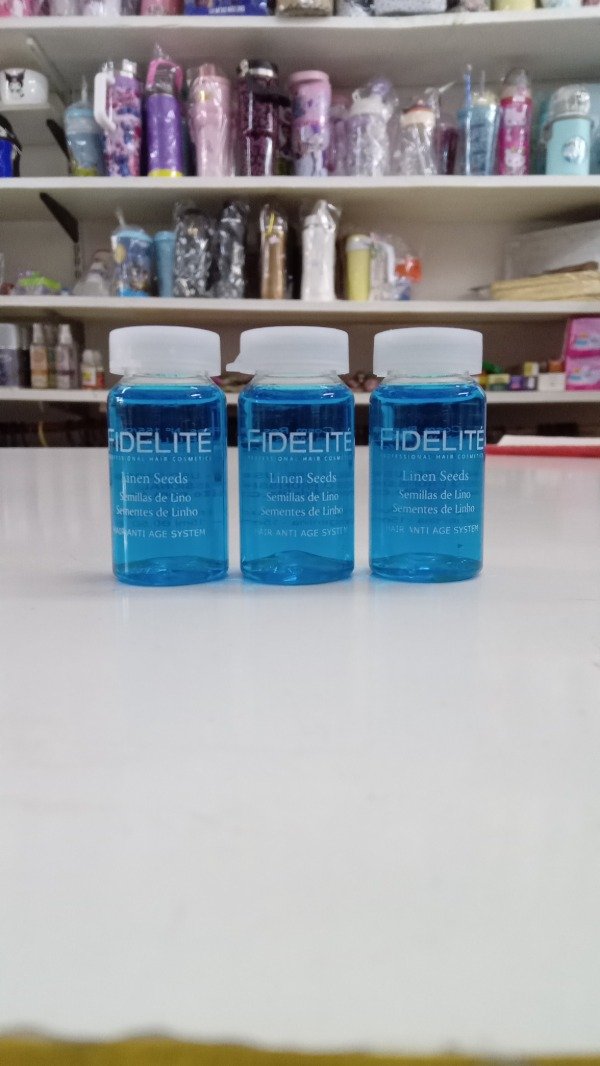 Producto - Ampollas 15ml tratamiento reestructurante semillas de lino Fidelite