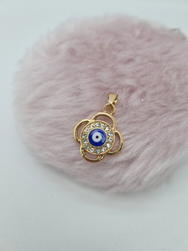 Producto - Dije acero dorado flor calada ojo turco