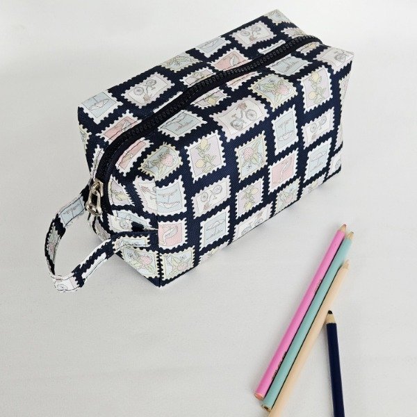 Producto - Cartuchera XL, estampillas