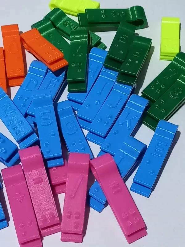 Producto - Sellos broches  Sistema Braille