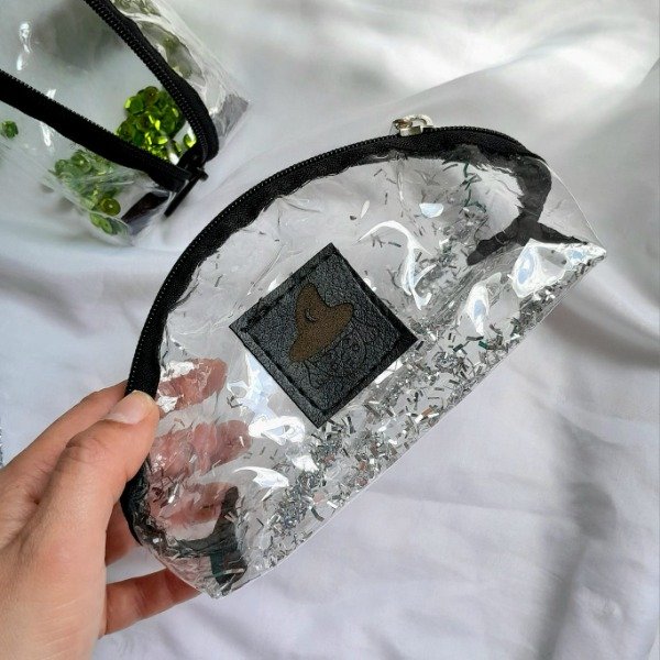 Producto - neceser medialuna glitter plateado