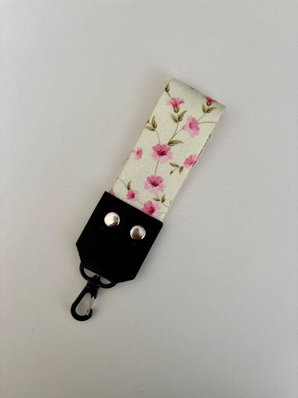 Producto - Llavero baby flores rosas