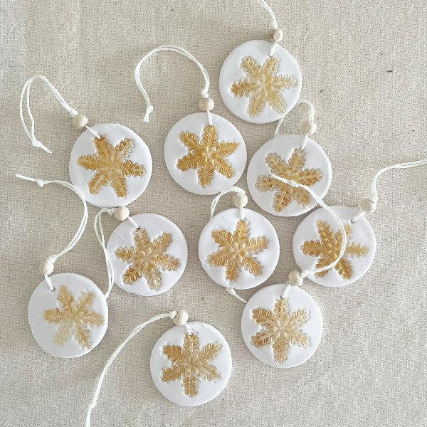 Producto - Circulo con copo dorado