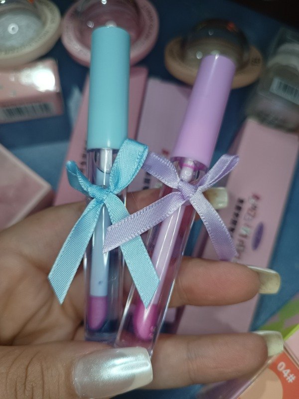 Producto - Gloss magic moño ad