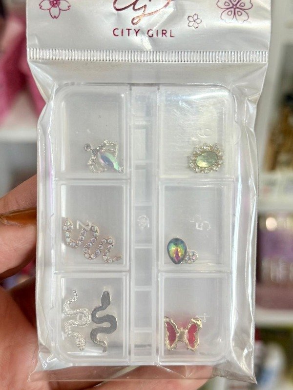 Producto - Apliques corona, serpientes y mariposas