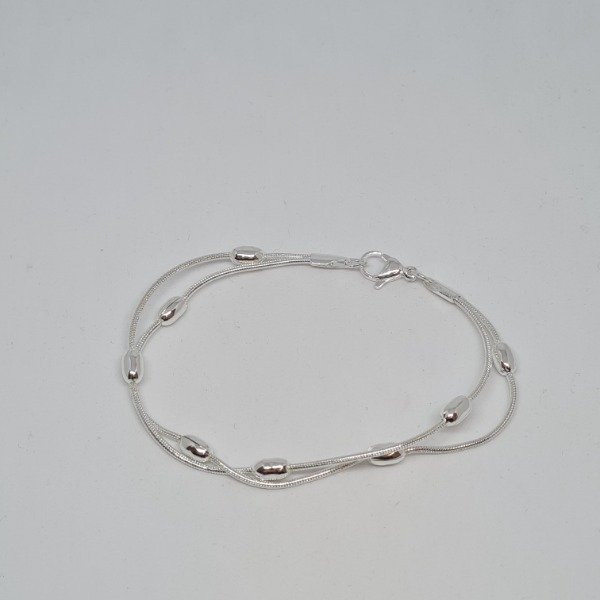 Producto - Pulsera plateada dos clapton c/aceitunas