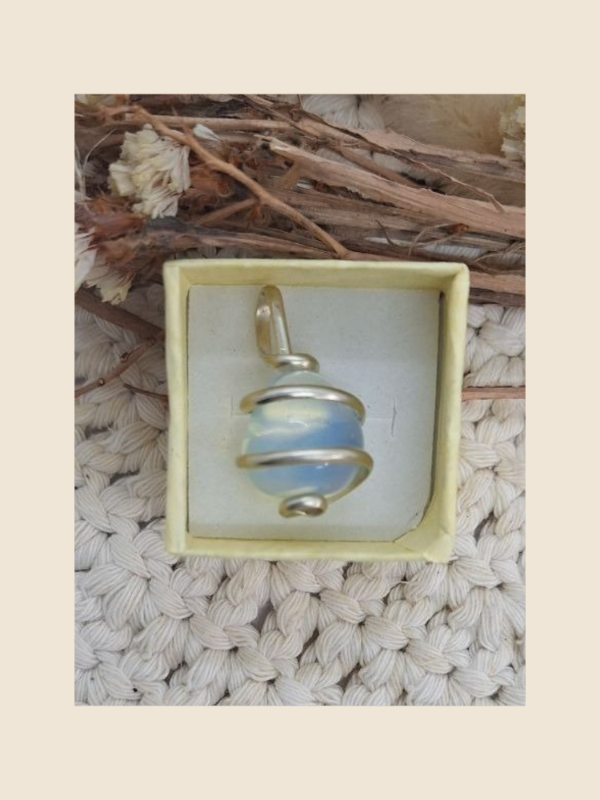 Producto - Dije orbita Opalina