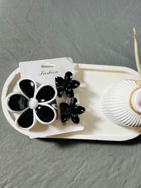 Producto - Set de broches flor negra