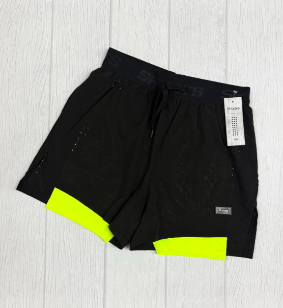 Producto - Short negro con calza fluor