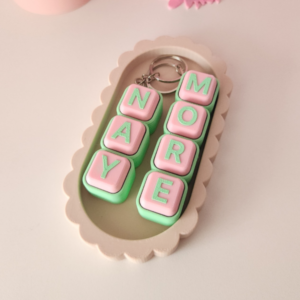 Producto - Llavero Clicker (precio según la cantidad de letras) - 1