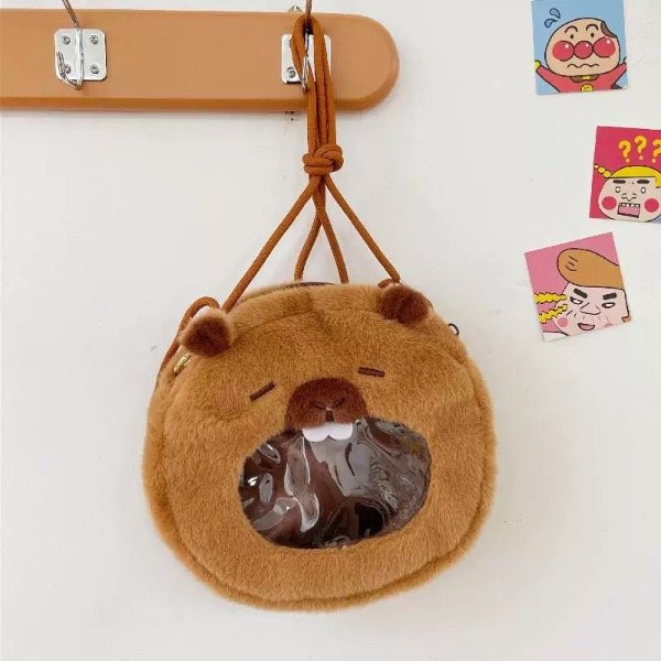 Producto - Cartera Capybara boca transp peluche