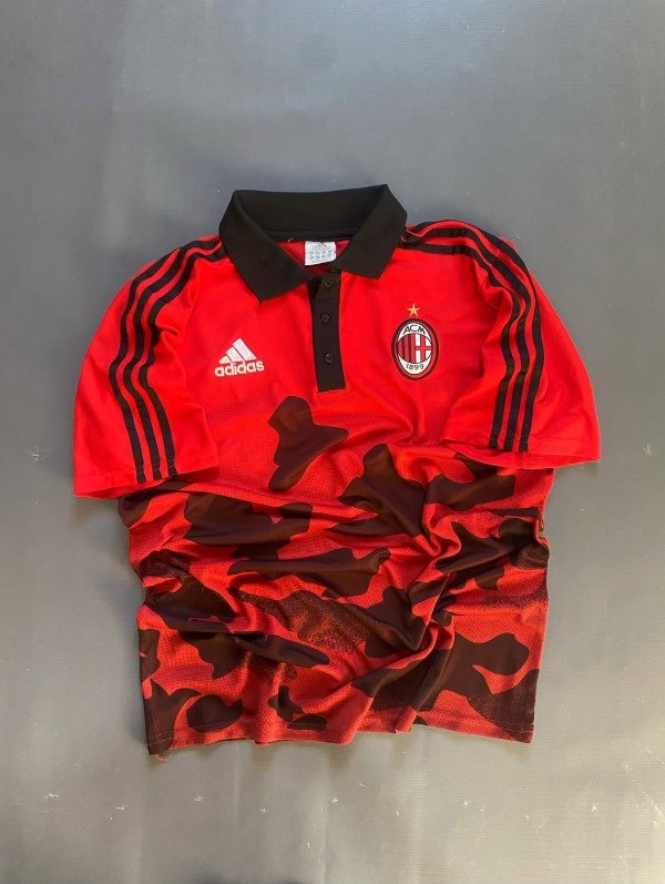 Producto - Chomba entrenamiento Milan 2023