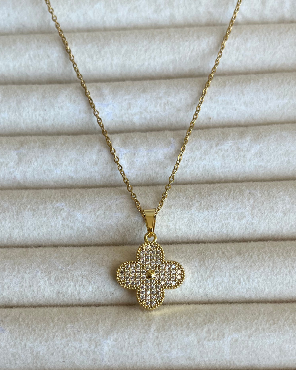 Producto - Cadena con dije flor de acero dorado 45cm