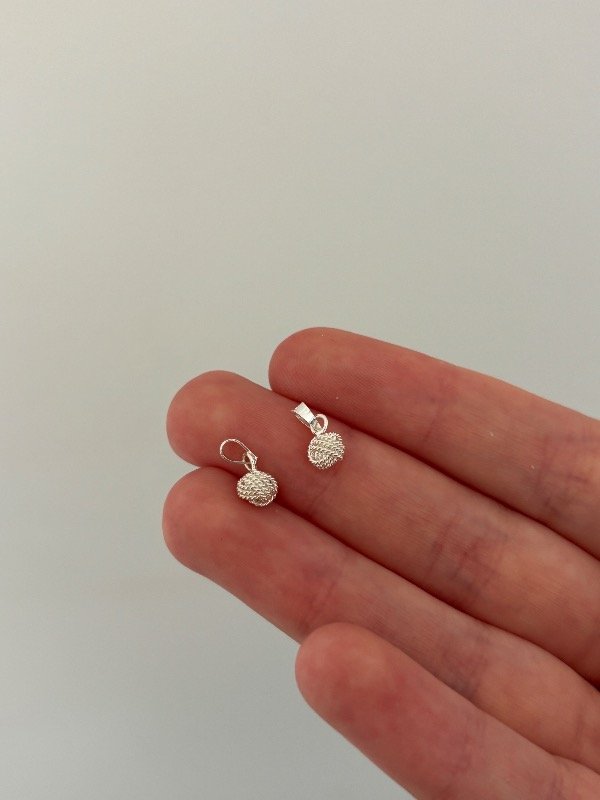 Producto - Dije Nudito