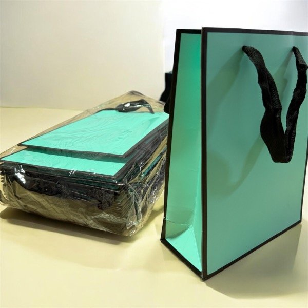 Producto - Bolsita de cartón color x 12 unidades