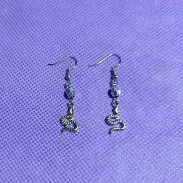 Producto - Par de aritos de Taylor Swift