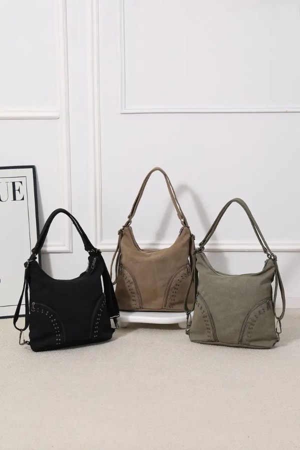 Producto - Cartera mochila rústica con tachitas