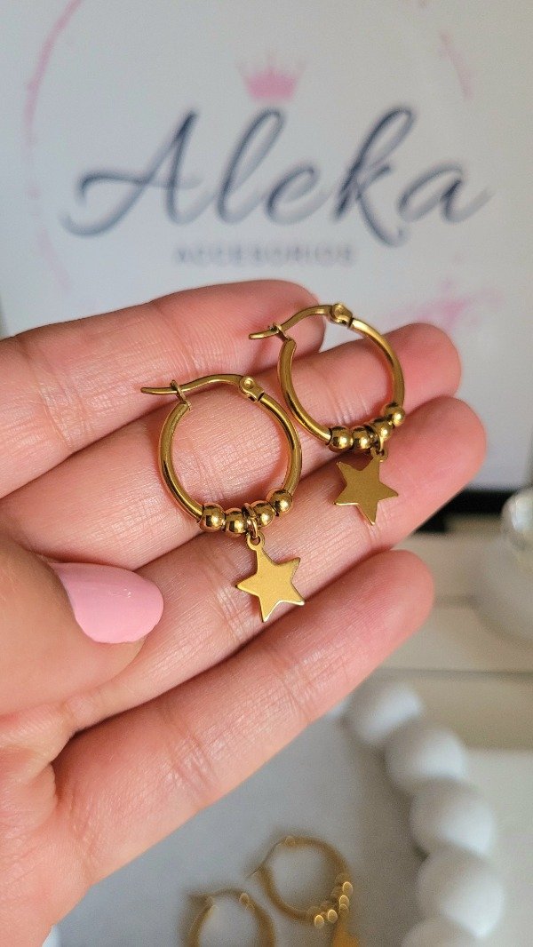 Producto - Argollas con dije estrella de acero dorado