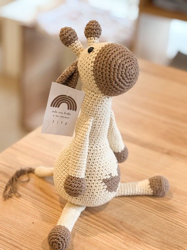 Producto - Muñeco de apego jirafa
