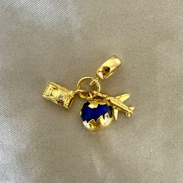 Producto - Charm mini viaje-Doble enchapado en oro 18k