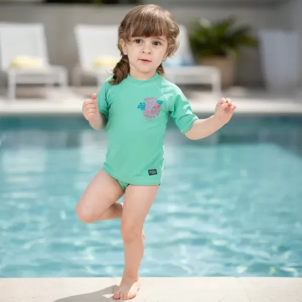 Producto - REMERA CON PROTECCION UV NIÑO - MANGAS CORTAS VERDE AGUA - ORIGAMI