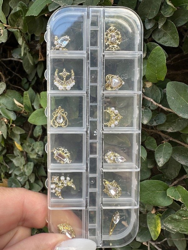 Producto - Box dijes Oro 12 unid