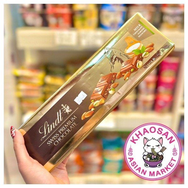 Producto - Chocolate con leche con pistachos -  Lindt chocolate suizo 300g