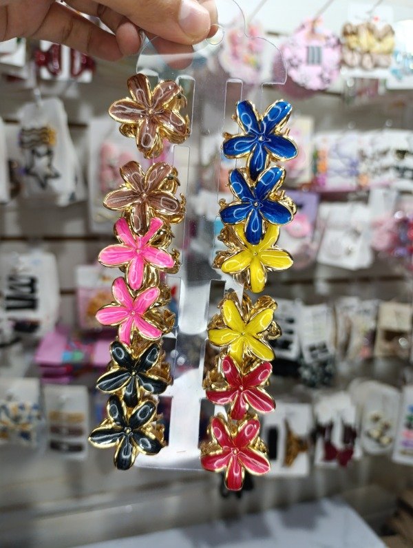 Producto - Hawaianitas de metal doradas x12