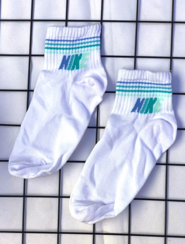 Producto - Tennis nike blancas con Celeste
