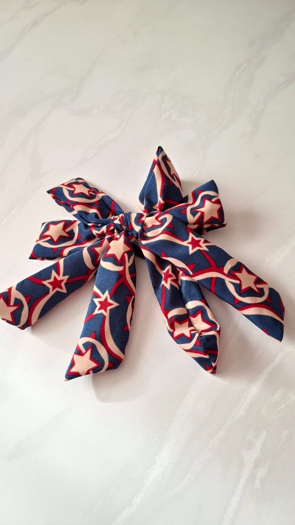 Producto - Moño azul estrellas