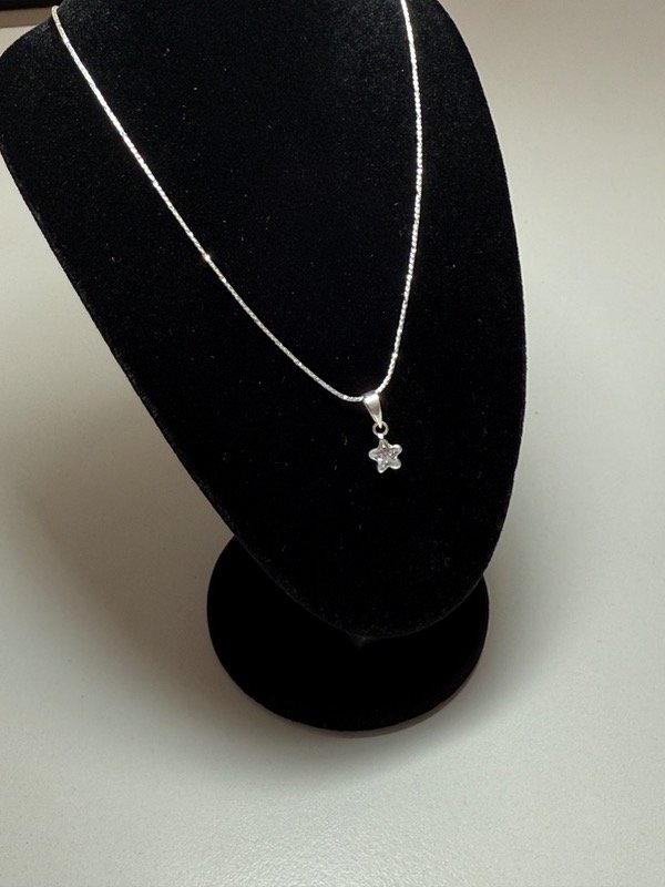 Producto - Cadena fina con dije piedra estrella blanca - 1