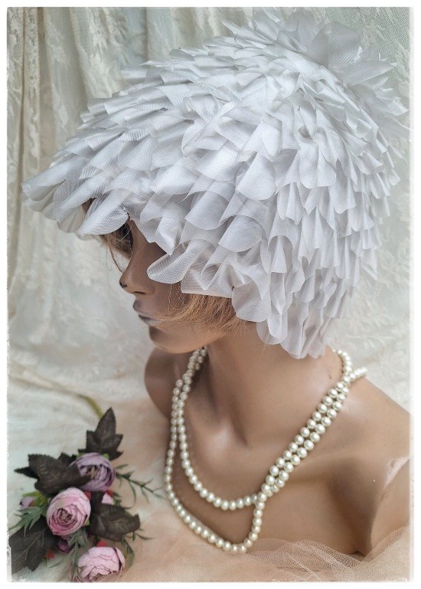Producto - Antigua Gorra de Baño plástica