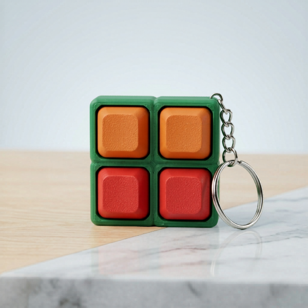 Producto - Fidget Antiestres Llavero 4 Teclas Mecánicas - Sonido - Verde
