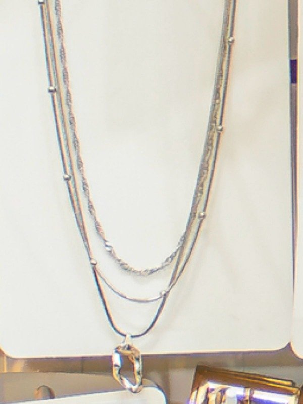 Producto - Coleccion Aniversario - Collar triple cadena con dije