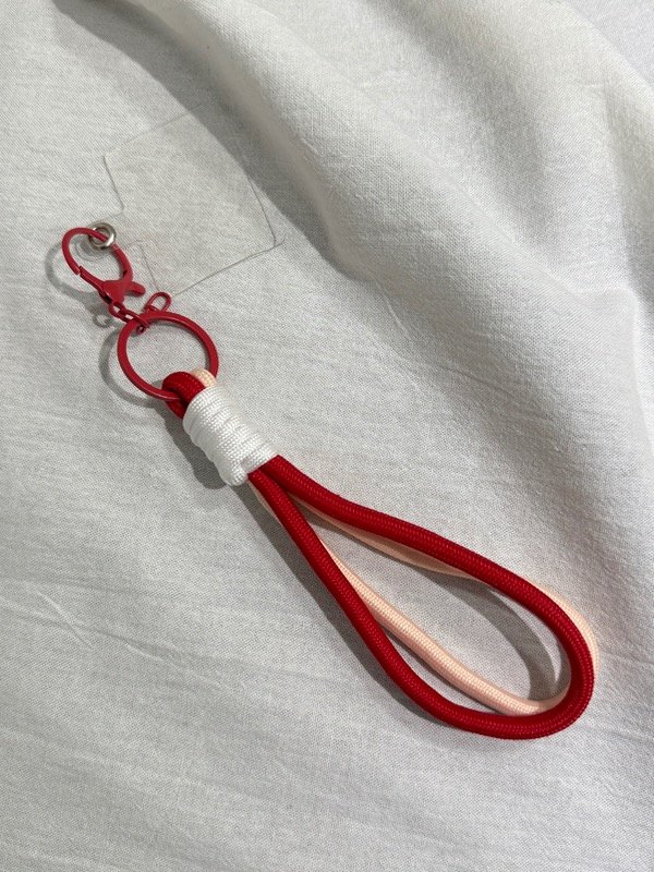 Producto - Handstrap rojo con rosa