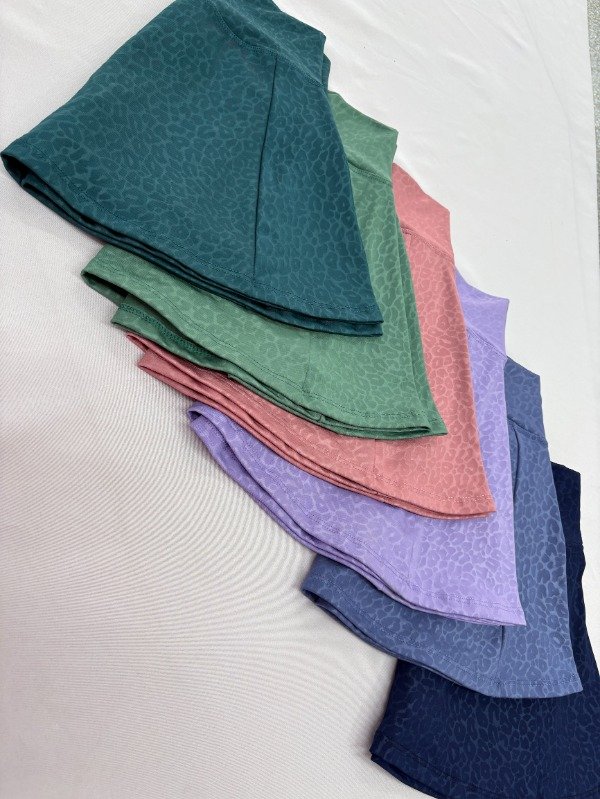 Producto - Polleras con short tiro algo gofradas ( consultar talle y color)