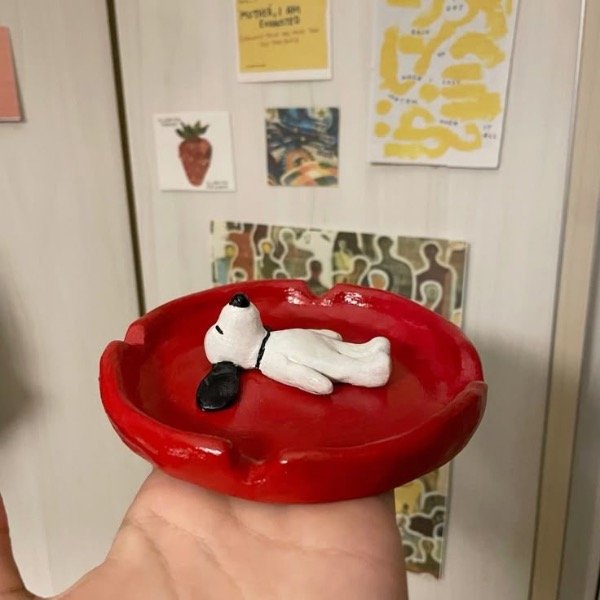 Producto - cenicero con figura