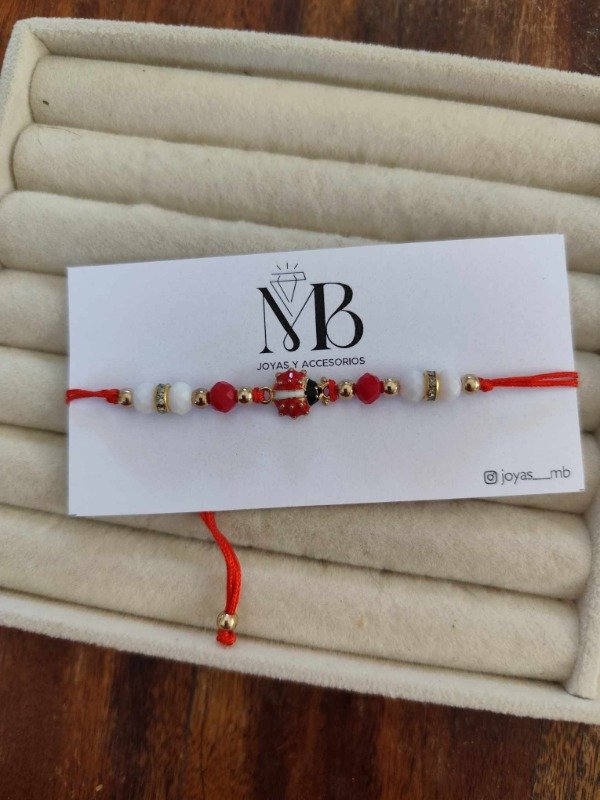 Producto - Pulsera vaquita blanca.